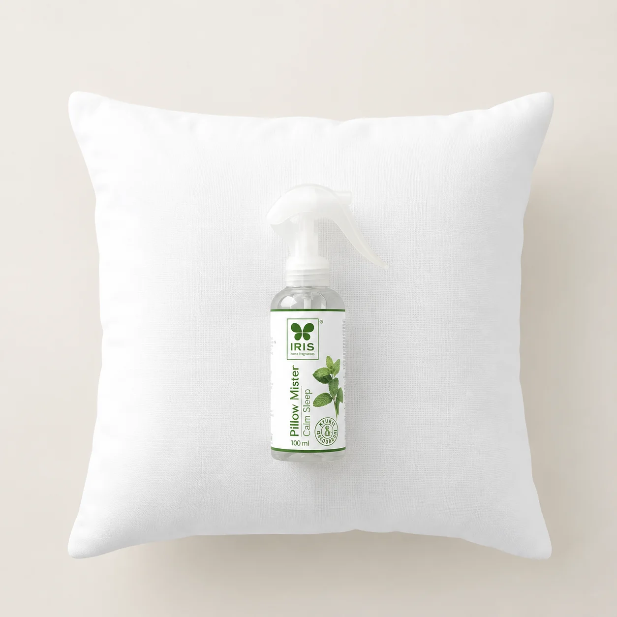 IRIS Calm Sleep pillow mister on a white pillow